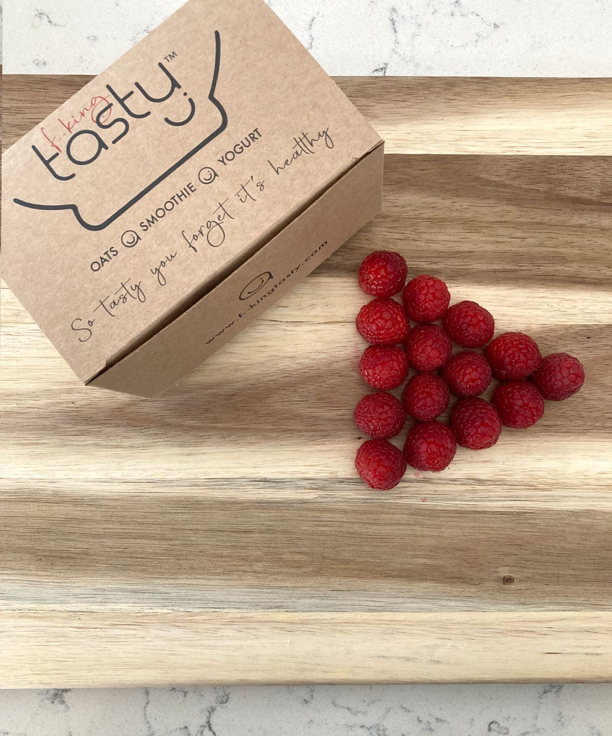 Raspberry f--king tasty product box